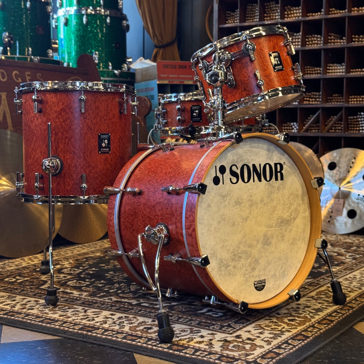 USED Sonor Sunset Beech Limited Edition Drum Set in Transparent Red Birdseye Maple Veneer - 14x18, 8x12, 14x14