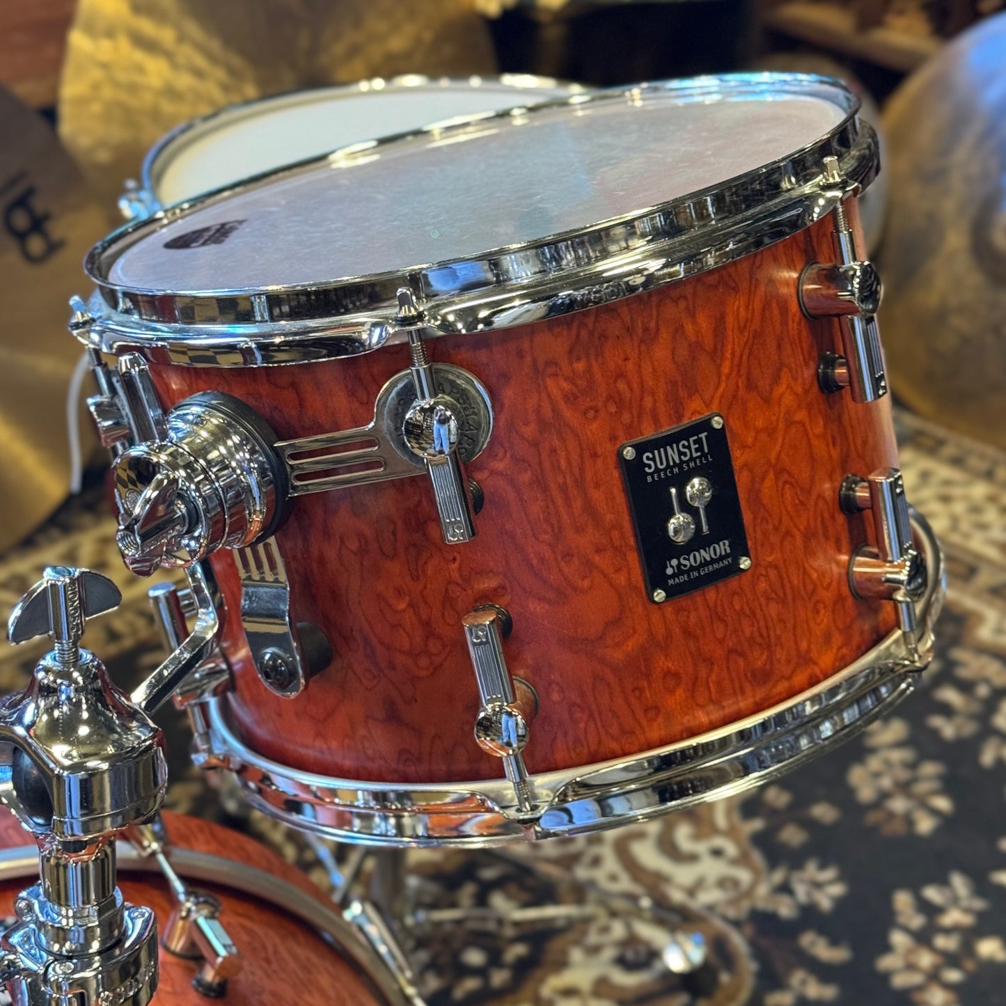 USED Sonor Sunset Beech Limited Edition Drum Set in Transparent Red Birdseye Maple Veneer - 14x18, 8x12, 14x14