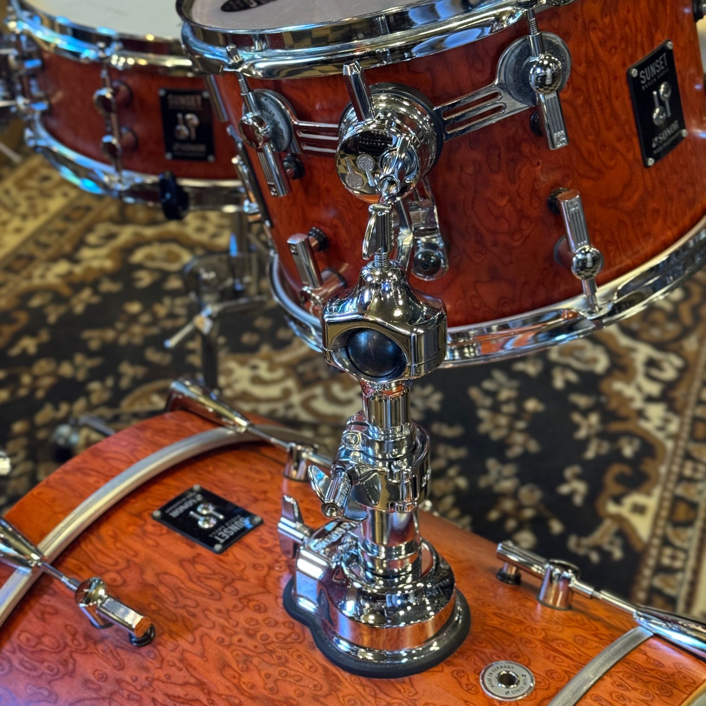 USED Sonor Sunset Beech Limited Edition Drum Set in Transparent Red Birdseye Maple Veneer - 14x18, 8x12, 14x14